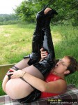 Outdoor MILF fetish with high heel boots, PVC, and dildo fucking